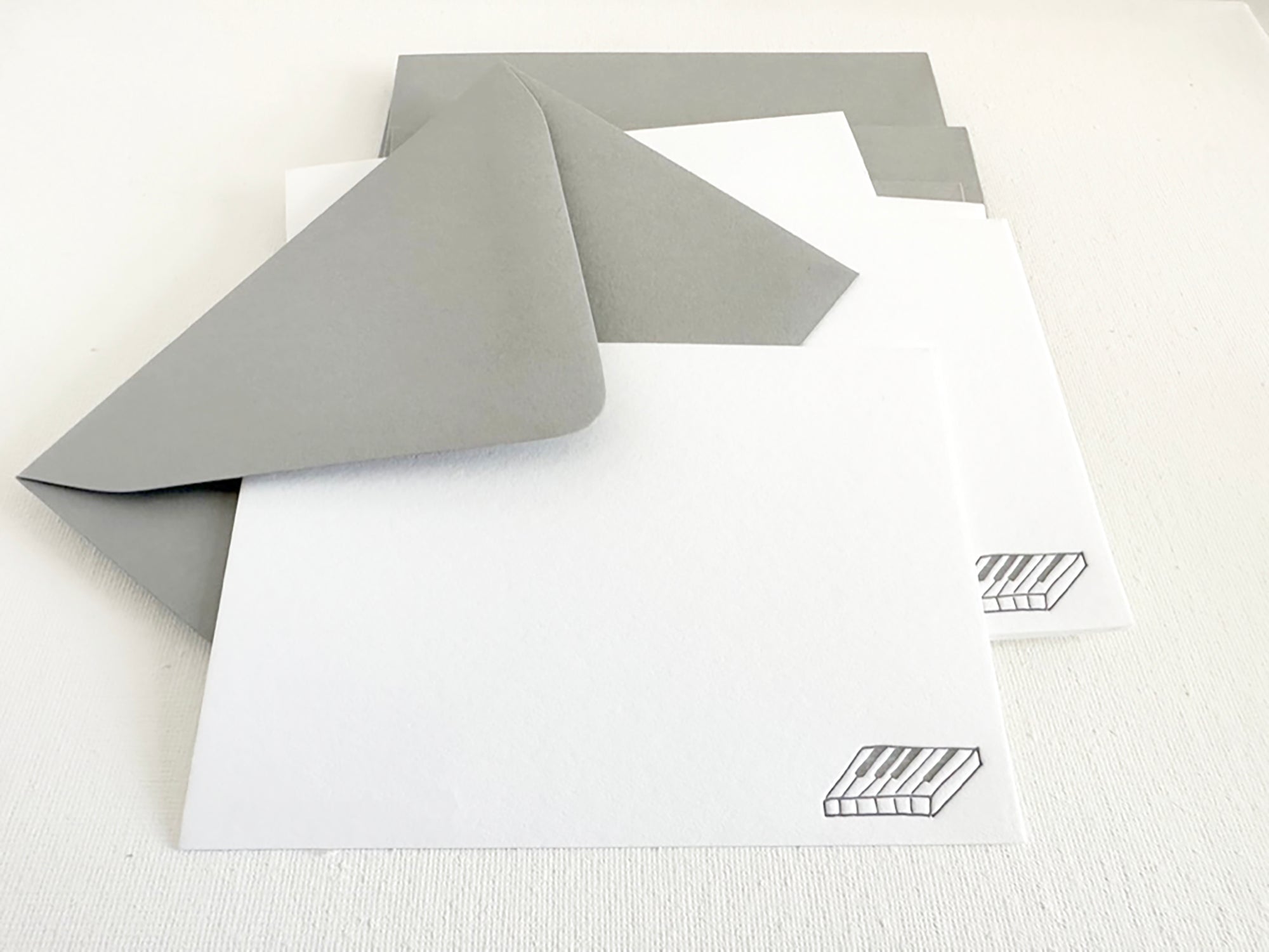 letterpress stationery with piano keys design
letterpress note cards with piano keys
boxed set of letterpress stationery with piano keys design